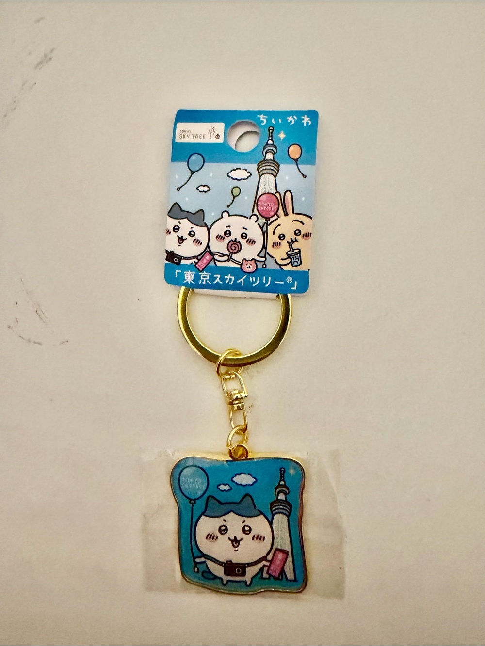 Sanrio blue Tokyo Skytree character keychain with gold ring